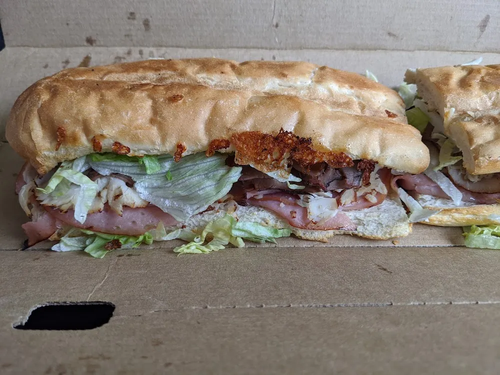 Ham Turkey and Roast Beef Club Sandwich